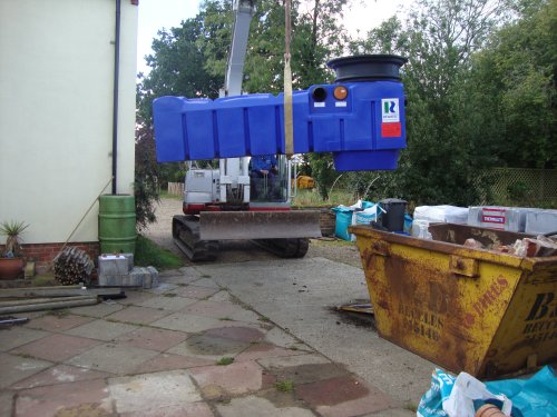 The rainwater tank being installed