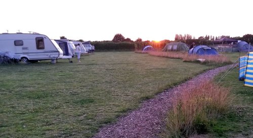 Sunset over the camping field